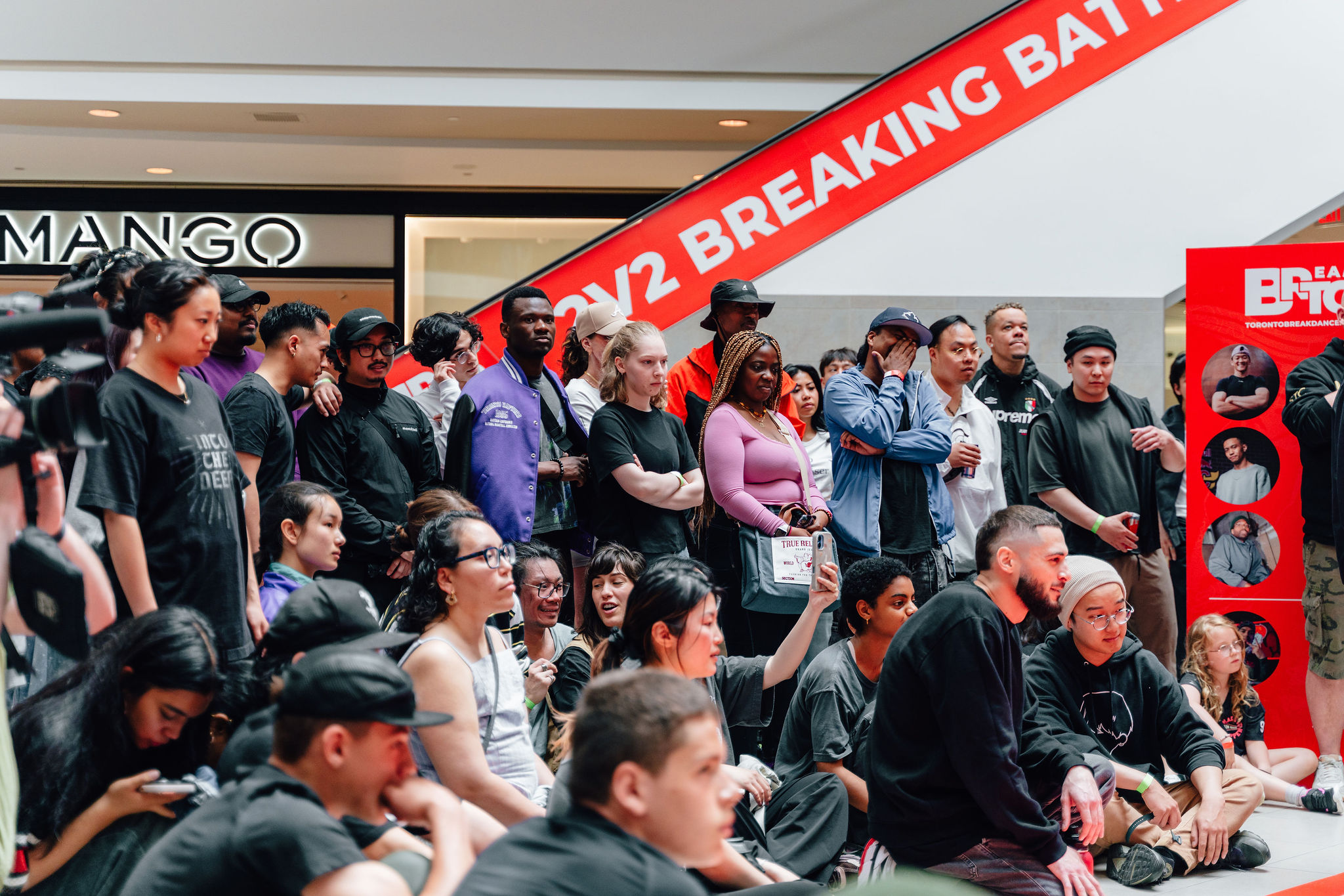 crowd watching breakdance